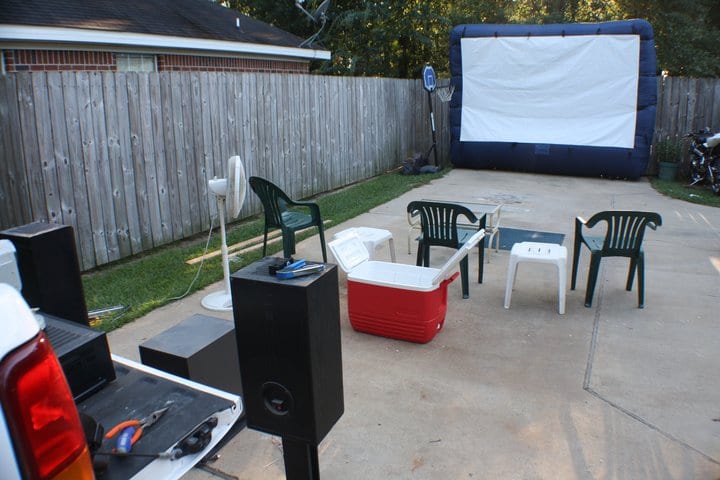 a screen, audio system, and seating arrangement